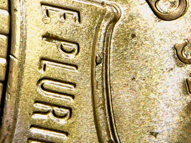 I-Found-11-2021-Pennies-In-A-Roll-With-A-Raised-Dot-On-Each-Shield-Rim.-Are-They-Worth-Keeping?